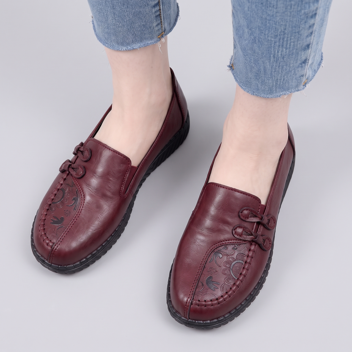 Andrea loafers in burgundy red seen from above, worn